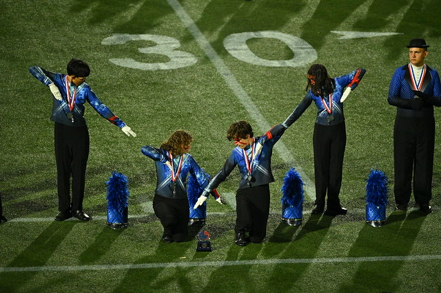 Lakota West Drum Majors (from left to right) Hamin Jeong, Morgan Cloud, Lincoln Gully, and Saumya Goel Saluting for Awards (Obetz 9/23)