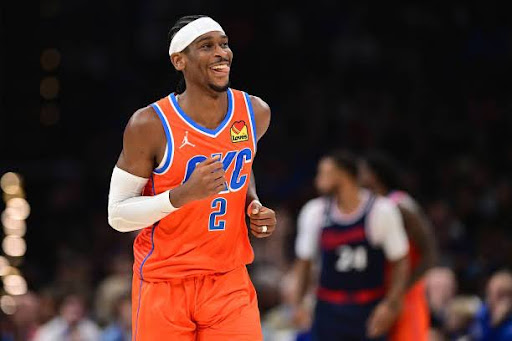 OKLAHOMA CITY, OKLAHOMA - NOVEMBER 11: Shai Gilgeous-Alexander #2 of the Oklahoma City Thunder flashes a smile during the first half against the Los Angeles Clippers at Paycom Center on November 11, 2024 in Oklahoma City, Oklahoma. NOTE TO USER: User expressly acknowledges and agrees that, by downloading and or using this photograph, User is consenting to the terms and conditions of the Getty Images License Agreement. (Photo by Joshua Gateley/Getty Images)