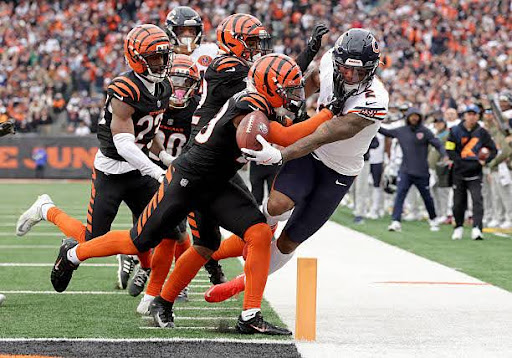 CINCINNATI, OHIO - NOVEMBER 02: DJ Moore #2 of the Chicago Bears scores a touchdown against Cam Taylor-Britt #29 of the Cincinnati Bengals during the fourth quarter in the game at Paycor Stadium on November 02, 2025 in Cincinnati, Ohio. (Photo by Michael Hickey/Getty Images)