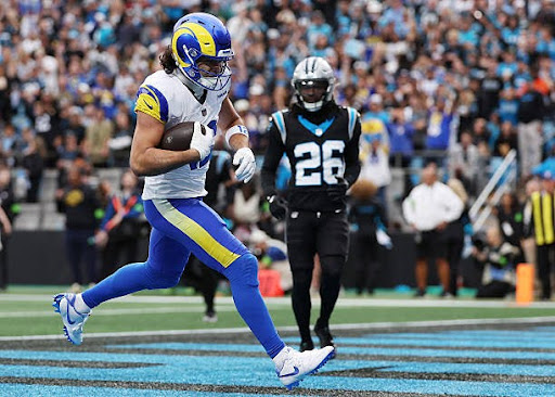 CHARLOTTE, NORTH CAROLINA - JANUARY 10: Puka Nacua #12 of the Los Angeles Rams scores a 14 yard touchdown against the Carolina Panthers during the first quarter in the NFC Wild Card Playoff game at Bank of America Stadium on January 10, 2026 in Charlotte, North Carolina. (Photo by David Jensen/Getty Images)