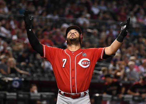PHOENIX, ARIZONA - SEPTEMBER 15: Eugenio Suarez #7 of the Cincinnati Reds reacts after hitting a solo home run off of Zac Gallen #59 of the Arizona Diamondbacks during the fourth inning at Chase Field on September 15, 2019 in Phoenix, Arizona. (Photo by Norm Hall/Getty Images)