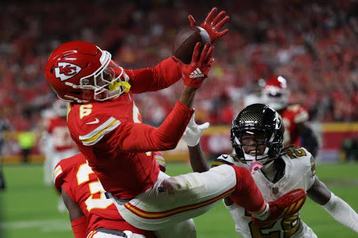 Bryan Cook #6 of the Kansas City Chiefs intercepts a pass during the first quarter against the New Orleans Saints at GEHA Field at Arrowhead Stadium on October 07, 2024 in Kansas City, Missouri. (Photo by Jamie Squire/Getty Images)