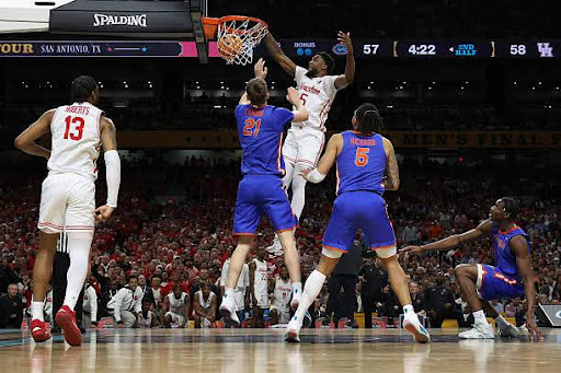 Image was captured using a remote camera.) Ja'Vier Francis #5 of the Houston Cougars dunks the ball against Alex Condon #21 of the Florida Gators during the second half in the National Championship of the NCAA Men's Basketball Tournament at the Alamodome on April 07, 2025 in San Antonio, Texas. (Photo by Jamie Squire/Getty Images)