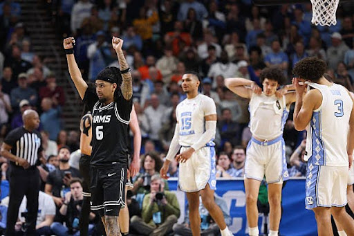 Terrence Hill Jr. #6 of the VCU Rams celebrates his team's win over the North Carolina Tar Heels during the first round of the 2026 NCAA Men's Basketball Tournament held at Bon Secours Wellness Arena on March 19, 2026 in Greenville, South Carolina. (Photo by Sam Wolfe/NCAA Photos via Getty Images)