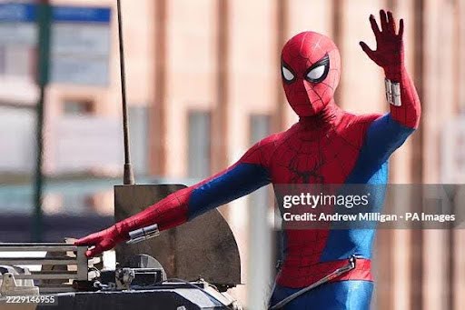 A person in a Spider-Man suit during filming on Hutcheson Street in Glasgow for the latest film in the Spider-Man franchise, Spider-Man: Brand New Day. The sequel will see Tom Holland reprise his main role and is set to be directed by Destin Daniel Cretton. Picture date: Wednesday August 13, 2025. (Photo by Andrew Milligan/PA Images via Getty Images)